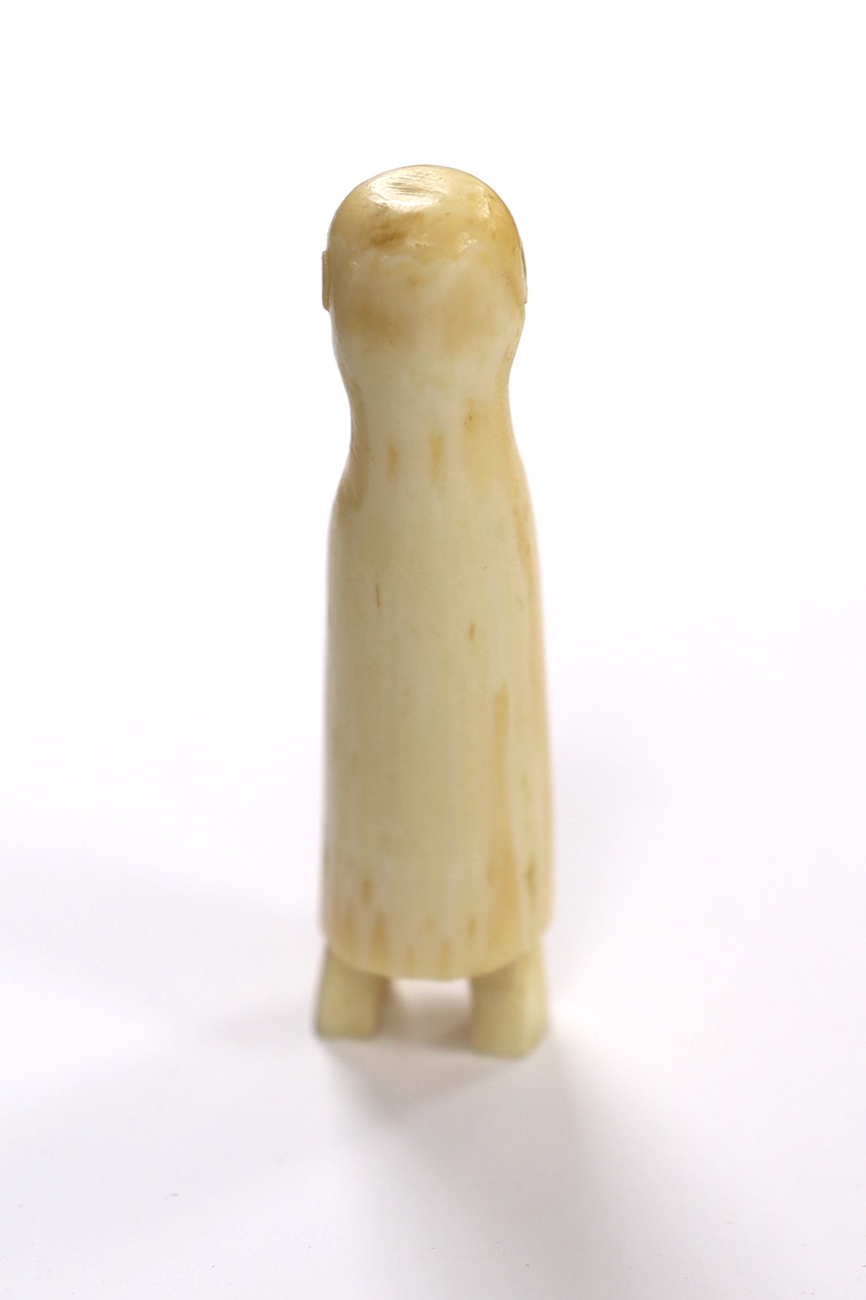 An Inuit (?) figural carved whale tooth, early 20th century, 8cm